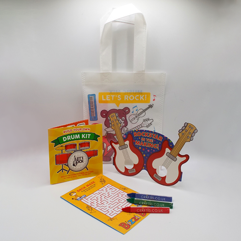 Load image into Gallery viewer, Food Activity bags, Music activity bags, Adventure activity bags, Sport activity bags.
Activity booklet, glasses, pop up model, Craftis crayons, three triangular .