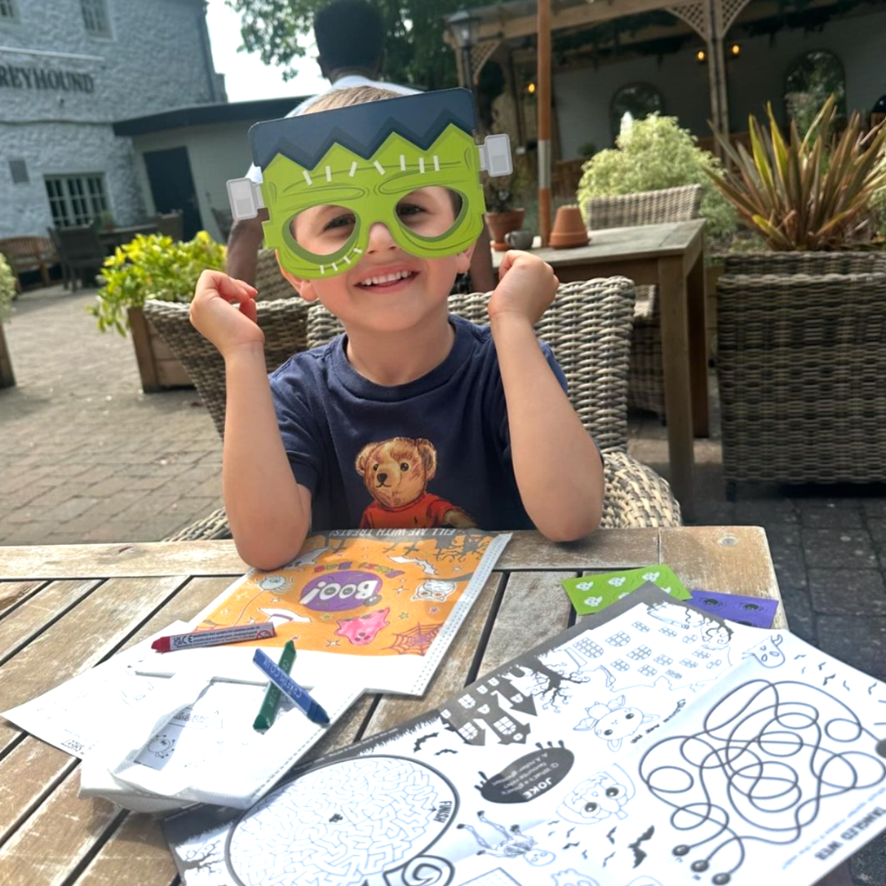 Boy with Halloween activity bag